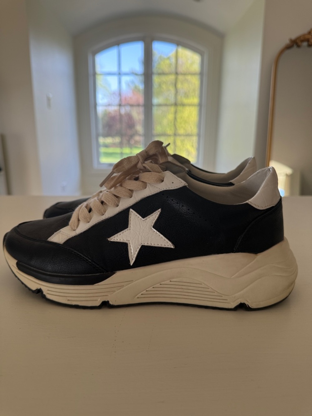 White Raven Black and White Star Accent Platform Sneakers